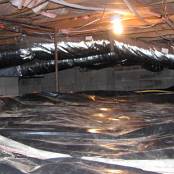 #16 Crawlspace After - Complete mold remediation has been performed, new insulation installed, electrical hazards corrected, and new vapor barrier installed.
